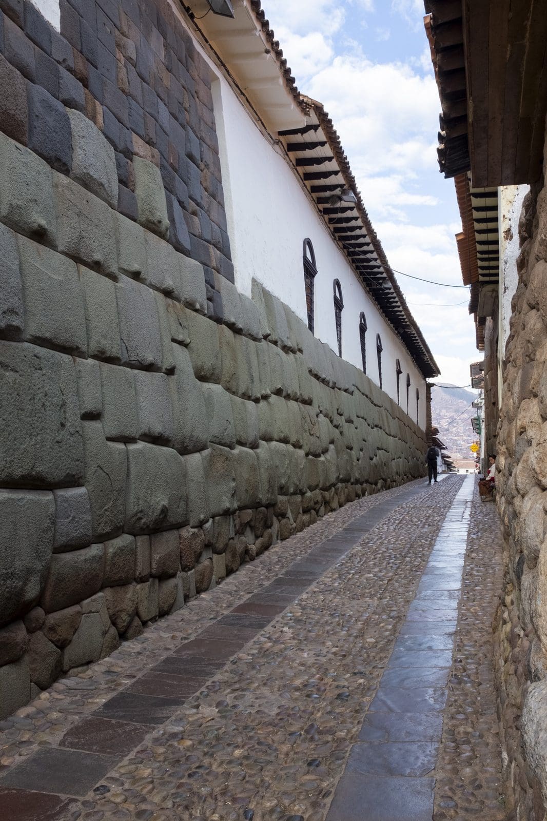 A narrow Cusco street lined with original Inca stonework