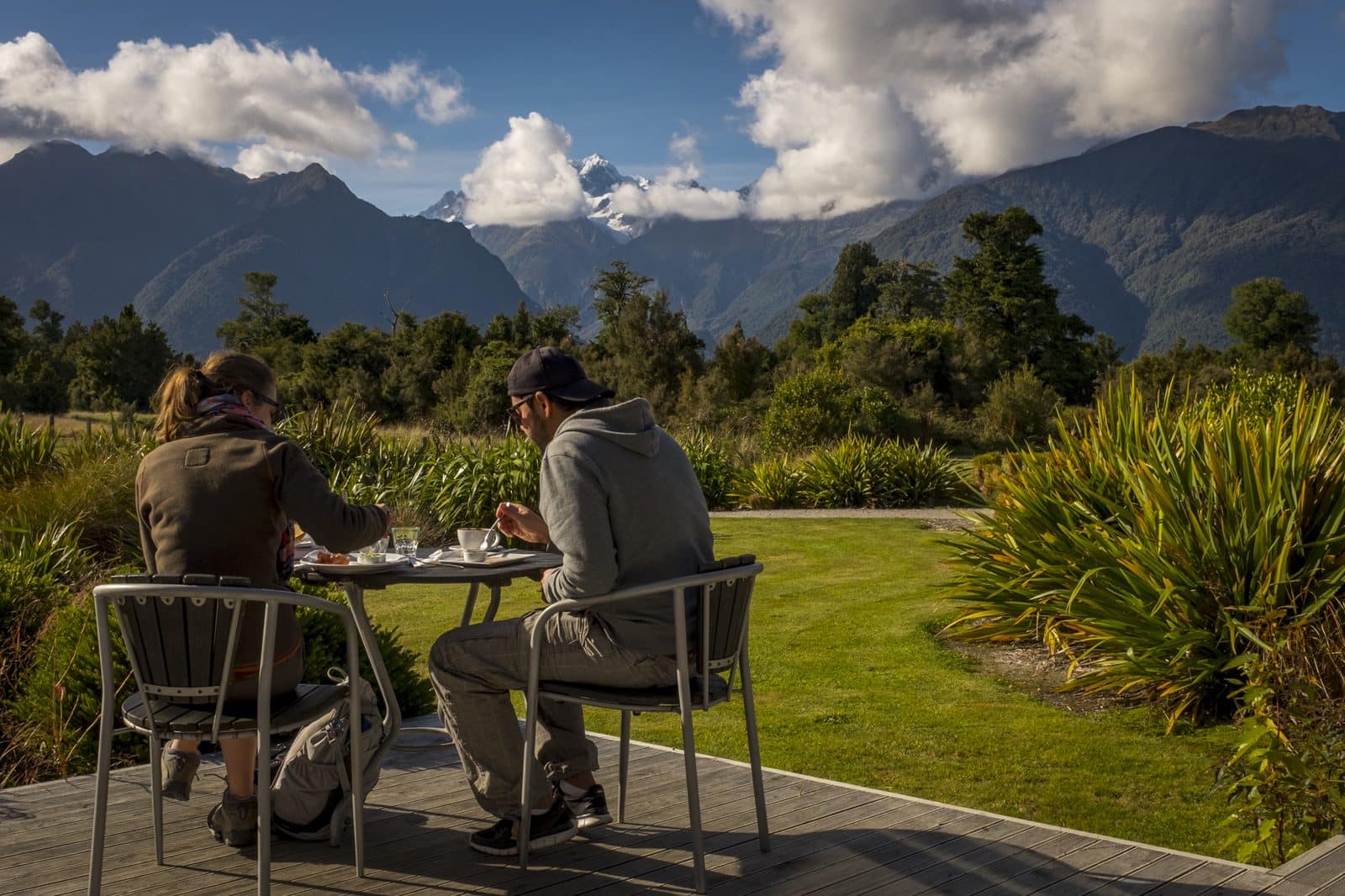 A roadside brew stop with the mountains behind