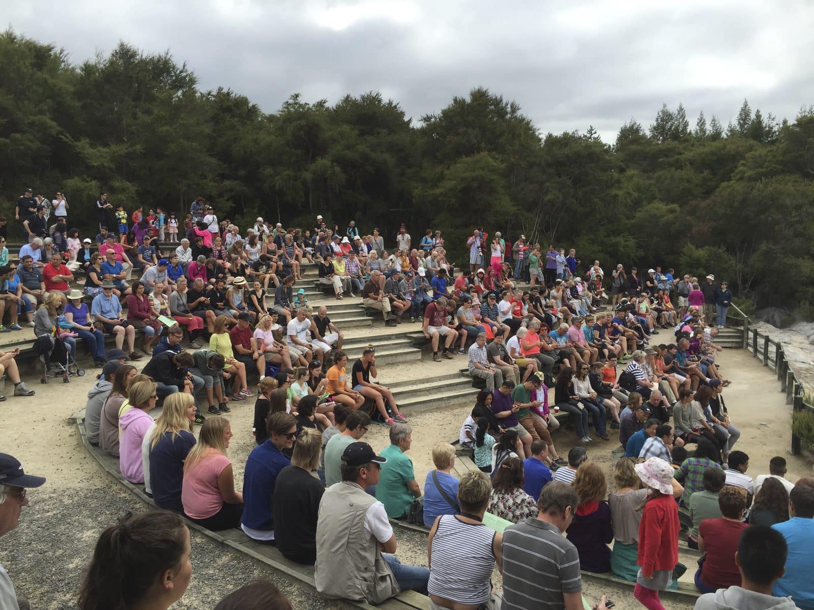 Crowds watching the Lady Jane geyser erupt at Wai-O-Tapu
