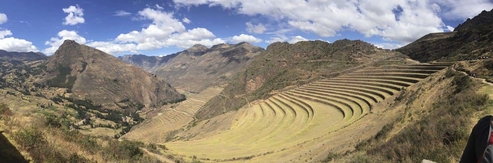 Curved Inca farming terraces cut into the hillside in the Sacred Valley