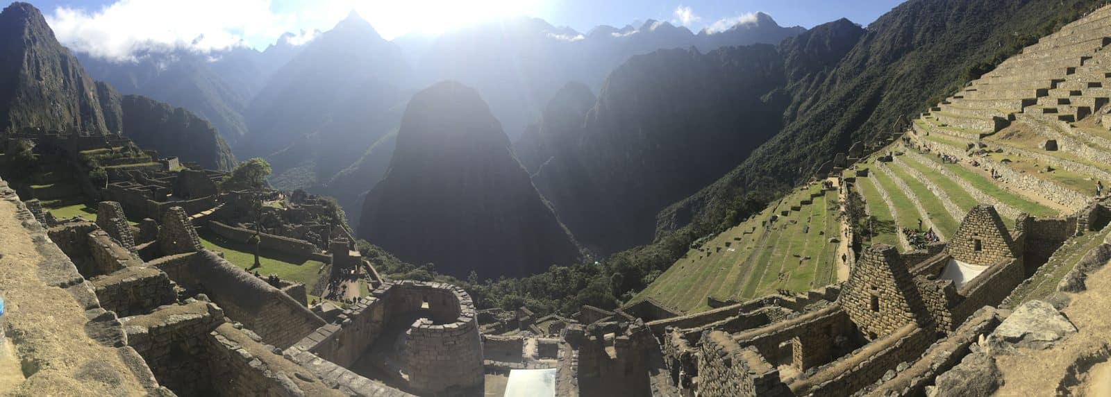 Morning sunlight breaking over the terraces at Machu Picchu
