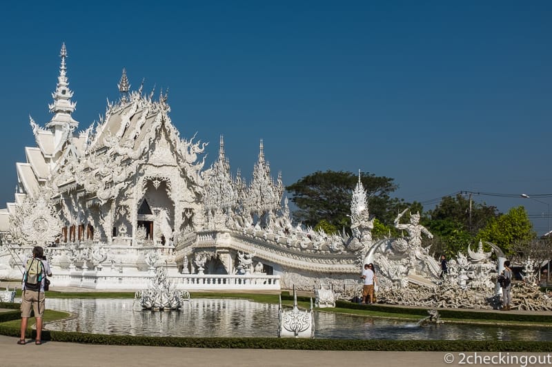 Front view of the White Temple looking across the small lake.