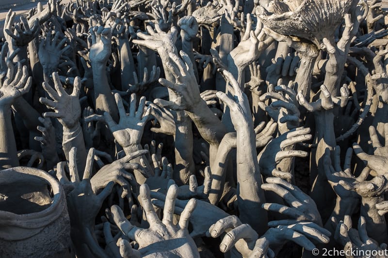 These crazy looking hands reaching out to grab sinners and drag them down to the underworld.