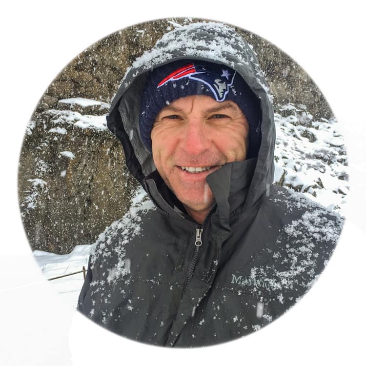 Steve outside the organic farm in Oregon in winter snow